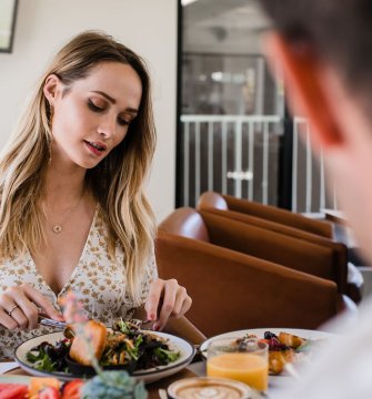 A woman eating dinner